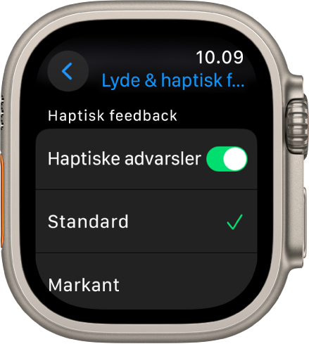 Indstillinger for Lyde & haptisk feedback på Apple Watch, med kontakten Haptiske advarsler og mulighederne Standard og Markant nedenunder.