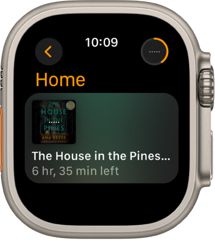 The Home screen in the Audiobooks app. The Now Playing button is at the top right. The currently playing book is shown in the middle, with the remaining time shown below the title.