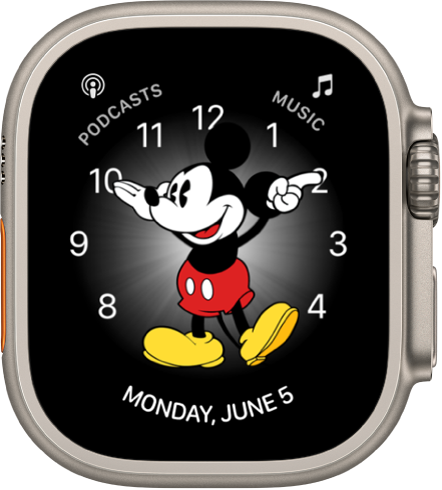 Kellakuva Mickey Mouse, kuhu saate lisada erinevaid komplikatsioone. Sellel kuvatakse kolm komplikatsiooni: üleval vasakul Podcasts, üleval paremal Music ning all Date.