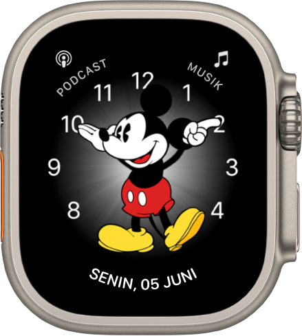 Wajah jam Mickey Mouse, di mana Anda dapat menambahkan banyak komplikasi. Wajah jam ini menampilkan tiga komplikasi: Podcast di bagian kiri atas, Musik di bagian kanan atas, dan Tanggal di bagian bawah.
