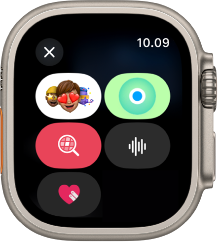 App Pesan menampilkan pilihan pesan, yang disertai dengan tombol Memoji, Lokasi, GIF, Audio, Digital Touch, dan Apple Cash.