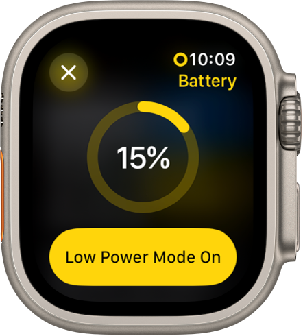 „Low Power Mode“ ekranas su daliniu geltonu žiedu, nurodančiu likusį įkrovimą. 15 proc. yra viduryje žiedo. „Lower Power Mode One“ mygtukas yra apačioje. Viršuje kairėje pateiktas mygtukas „Close“.