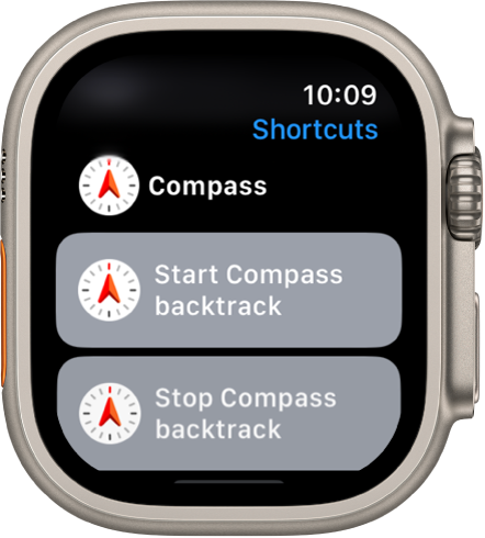 Lietotne Shortcuts pulkstenī Apple Watch ar divām Compass saīsnēm — Start Compass atgrieze un Stop Compass atgrieze.