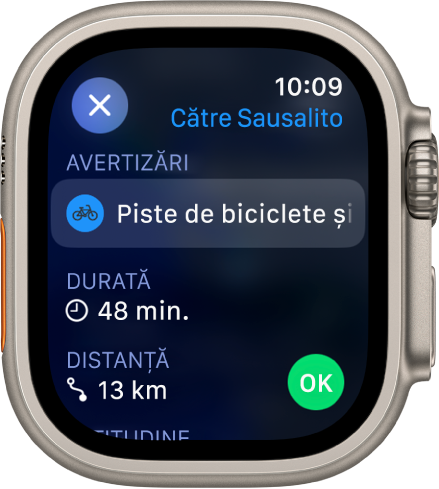 Aplicația Hărți afișând detaliile unei călătorii cu bicicleta. Avertizările despre traseu apar în partea de sus și timpul și distanța până la destinație apar dedesubt. Un buton Start este în dreapta jos.