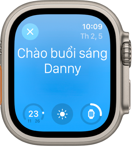 Apple Watch đang hiển thị màn hình thức dậy. Các từ Chào buổi sáng xuất hiện ở trên cùng. Mức pin ở bên dưới.