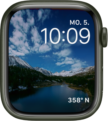 Auf dem Zifferblatt „Zeitraffer“ wird ein Zeitraffervideo einer schönen Landschaft angezeigt. Unten befindet sich die Komplikation „Kompass/Richtung“.