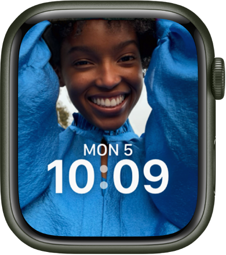 The Portraits watch face shows a photo from your synced photo album. The date and time is in the lower third of the screen.