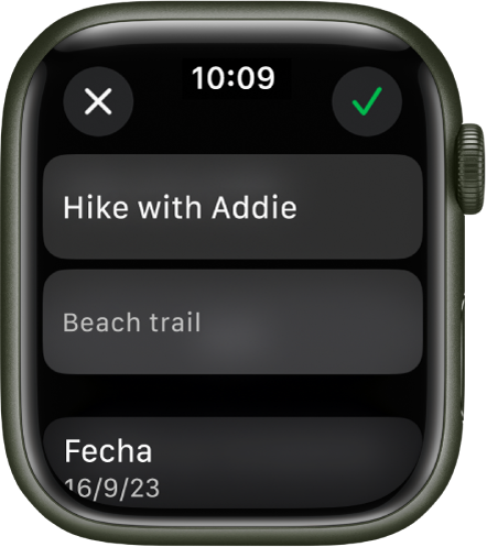 La pantalla Editar de la app Recordatorios en el Apple Watch. El nombre del recordatorio aparece en la parte superior con una descripción debajo. En la parte de abajo está la fecha a la que está programado el recordatorio. Arriba a la derecha se muestra un botón de completado. Arriba a la izquierda hay un botón de cerrar.