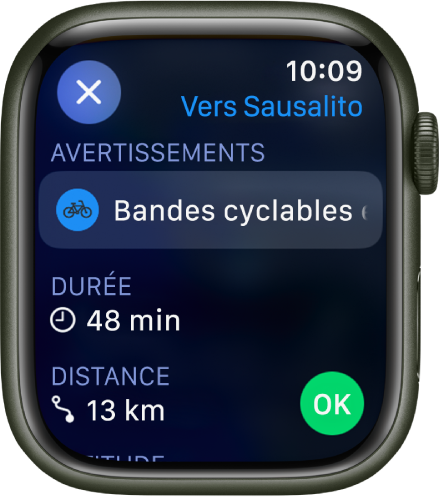 L’app Plans affichant les détails d’un itinéraire à vélo. Des avertissements liés à l’itinéraire sont affichés en haut de l’écran, avec la durée et la distance du trajet en dessous. Un bouton OK se trouve en bas à droite.