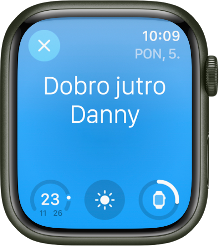 Apple Watch prikazuje zaslon buđenja. Riječi Dobro jutro prikazuju se pri vrhu. Razina napunjenosti baterije je ispod.