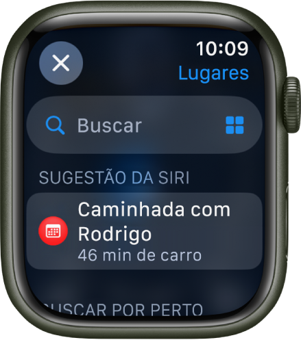 Tela Buscar no app Mapas, com o campo de Busca próximo à parte superior. Uma sugestão da Siri aparece abaixo. O texto Buscar por Perto aparece perto da parte inferior.