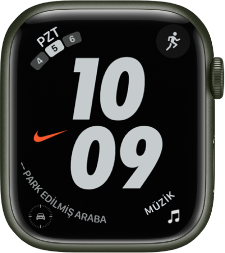 Nike Hybrid saat kadranı, ortada büyük rakamlarla saati gösteriyor. Gösterilen dört komplikasyon vardır: Sol üstte Takvim, sağ üstte Antrenman, sol altta Park Edilmiş Araba Ara Noktası ve sağ altta Müzik bulunur.
