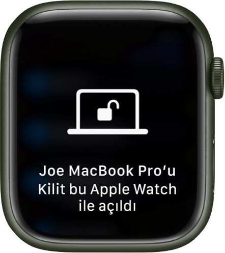 “Ali’nin MacBook Pro’sunun kilidi bu Apple Watch tarafından açıldı” iletisini gösteren Apple Watch ekranı.