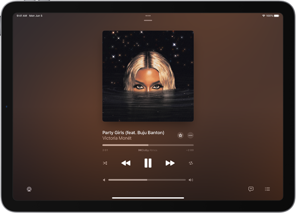 The Now Playing screen showing the album art. Below are the song title, artist name, Favorite button, More button, playhead, play controls, volume slider, Playback Destination button, Lyrics button, and Queue button. The Hide Now Playing button is at the top.