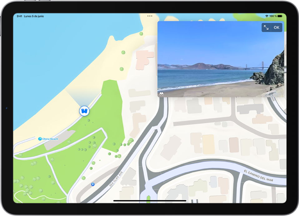 Vista panorámica móvil de 360 grados encima de un mapa del área. El icono Vista panorámica superpuesto en el mapa señala la dirección de la vista.
