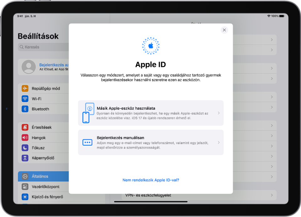 A Beállítások képernyő, a képernyő közepén látható Apple ID bejelentkezési párbeszédablakkal.