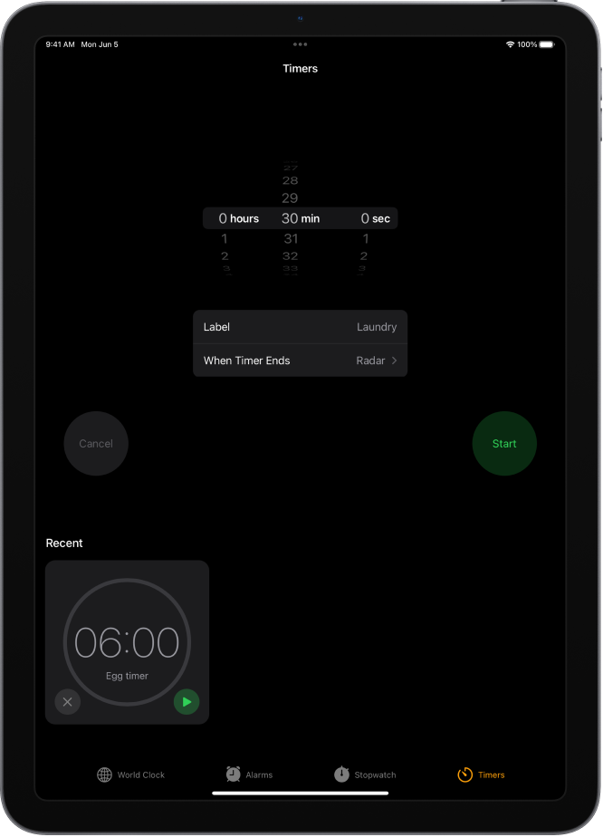 Skirtuke „Timers“ rodomos laikmačio sąrankos nustatymai. Po laiko nustatymais yra neseniai sukurtas laikmatis. Mygtukai „World Clock“, „Alarm“, „Stopwatch“ ir „Timers“ mygtukai rodomi ekrano apačioje.
