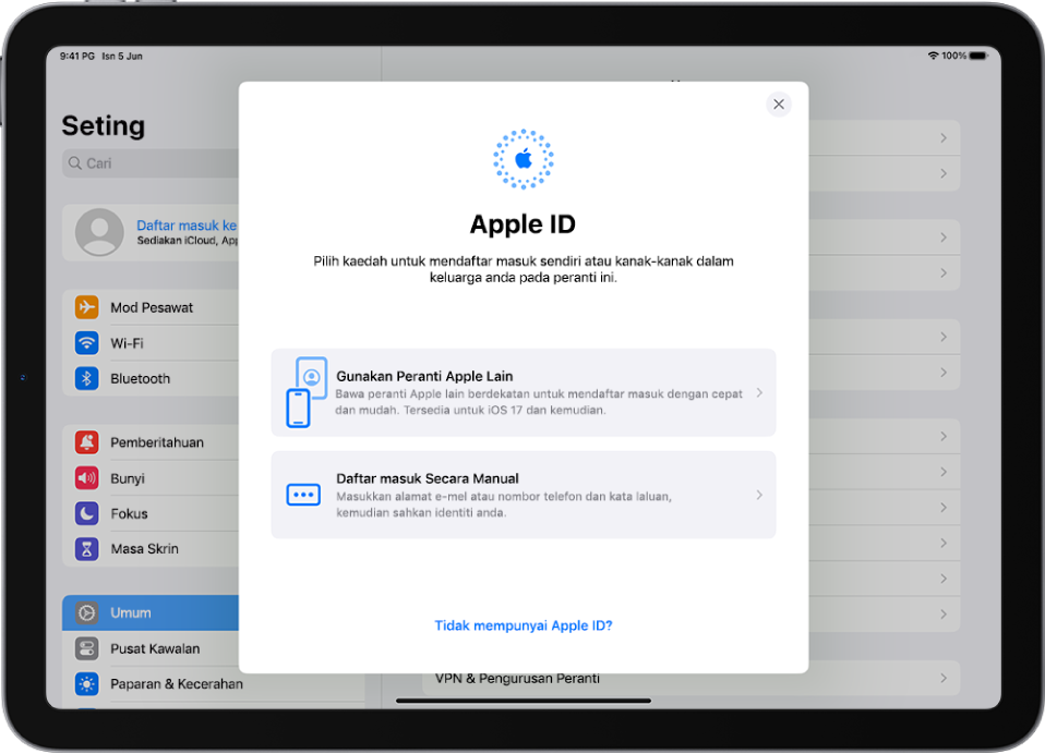 Skrin Seting, dengan dialog daftar masuk Apple ID di bahagian tengah skrin.