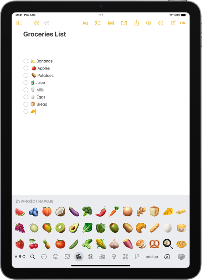 Notatka otworzona w aplikacji Notatki, widoczna w górnej części ekranu. Na dole ekranu wyświetlana jest klawiatura emoji.