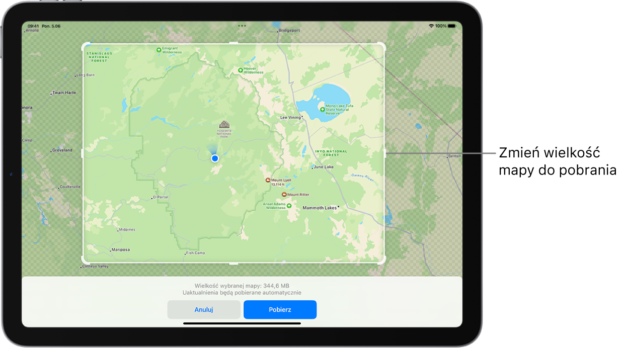 iPad wyświetlający mapę parku narodowego. Park otoczony jest prostokątem z uchwytami. Uchwyty te można przesunąć, aby zmienić wielkość mapy do pobrania. Wielkość mapy do pobrania wyświetlana jest na dole mapy. Na dole ekranu znajdują się przyciski Anuluj oraz Pobierz.