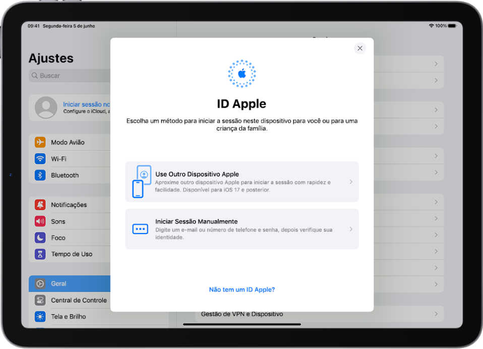 A tela Ajustes com o diálogo de início de sessão do ID Apple no centro da tela.