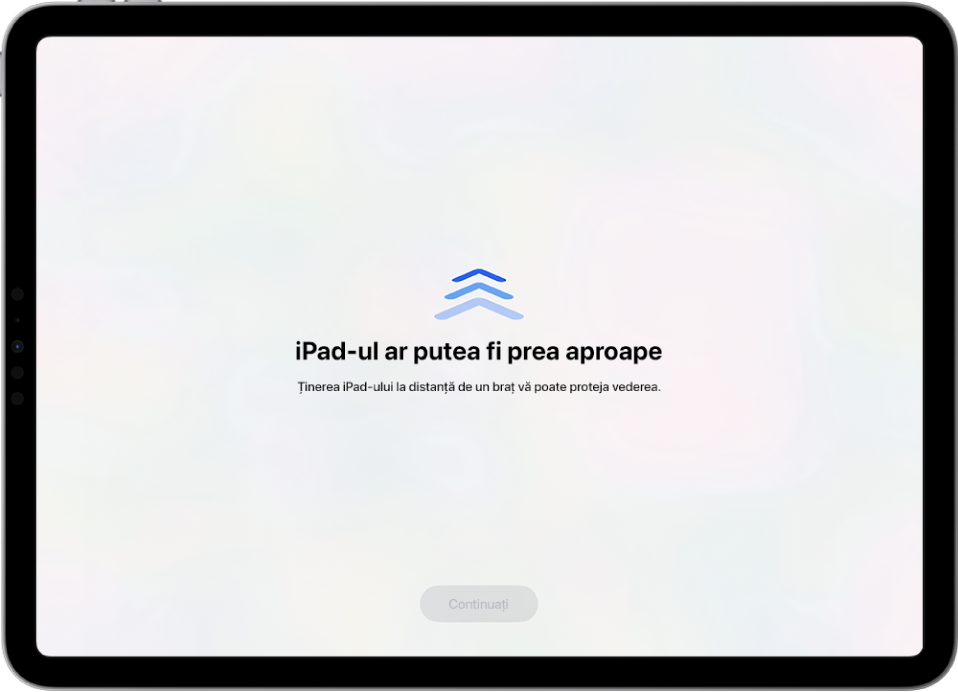 Un ecran cu un avertisment că iPad‑ul este prea aproape și o sugestie de a ține iPad‑ul la distanța de un braț. Când iPad‑ul se îndepărtează, butonul Continuați apare în partea de jos pentru a putea reveni la ecranul anterior.
