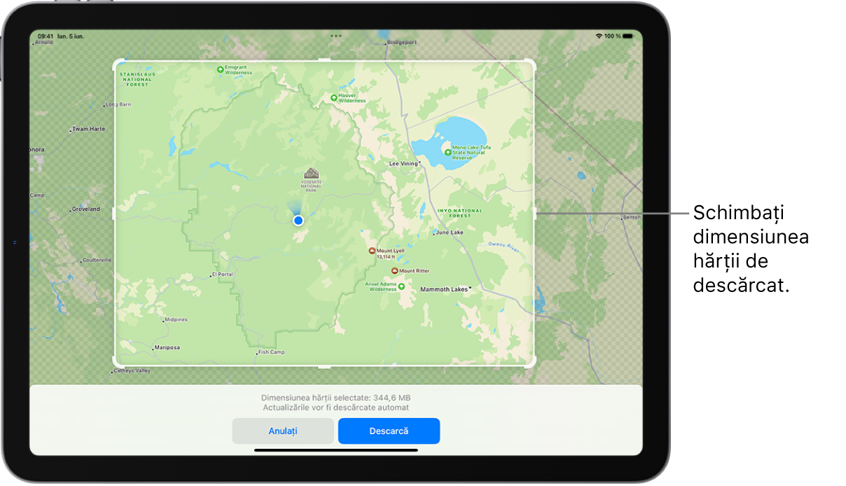 Un iPad cu harta unui parc național. Parcul este încadrat de un dreptunghi cu mânere, care pot fi mutate pentru a schimba dimensiunea hărții de descărcat. Dimensiunea de descărcare a hărții selectate este indicată în apropierea părții de jos a hărții. Butoanele Anulați și Descărcați se află în partea de jos a ecranului.