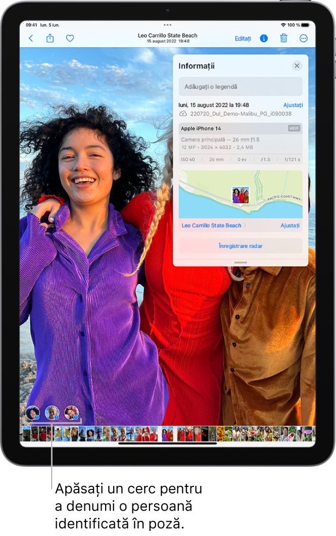 Ecranul iPad-ului afișează o poză deschisă în aplicația Poze. În colțul din stânga jos al pozei se află semne de întrebare lângă persoanele care apar în poză.