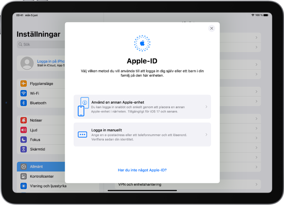 Skärmen Inställningar med inloggningsdialogen för Apple‑ID i mitten av skärmen.