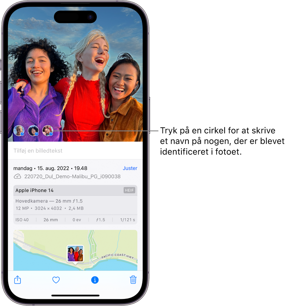 Den øverste halvdel af skærmen på iPhone viser et foto, der er åbent i appen Fotos. I det nederste venstre hjørne af fotoet er der spørgsmålstegn ved siden af personerne på fotoet.