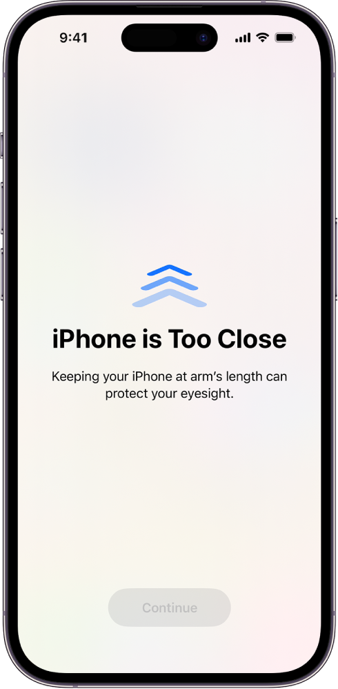 A screen warning that you’re holding the iPhone too close and that you should move it farther away to protect your vision health. The warning covers the screen, stopping you from continuing. There’s a Continue button that becomes active when you’ve moved your iPhone a safe distance away.