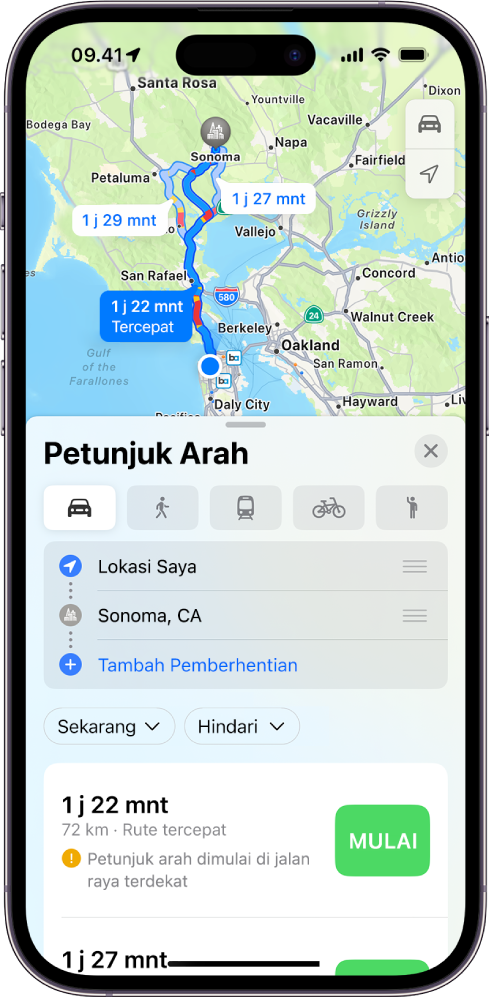 iPhone dengan Peta rute berkendara dengan jarak, perkiraan durasi, dan tombol Mulai. Setiap rute menampilkan kode warna untuk kondisi lalu lintas.
