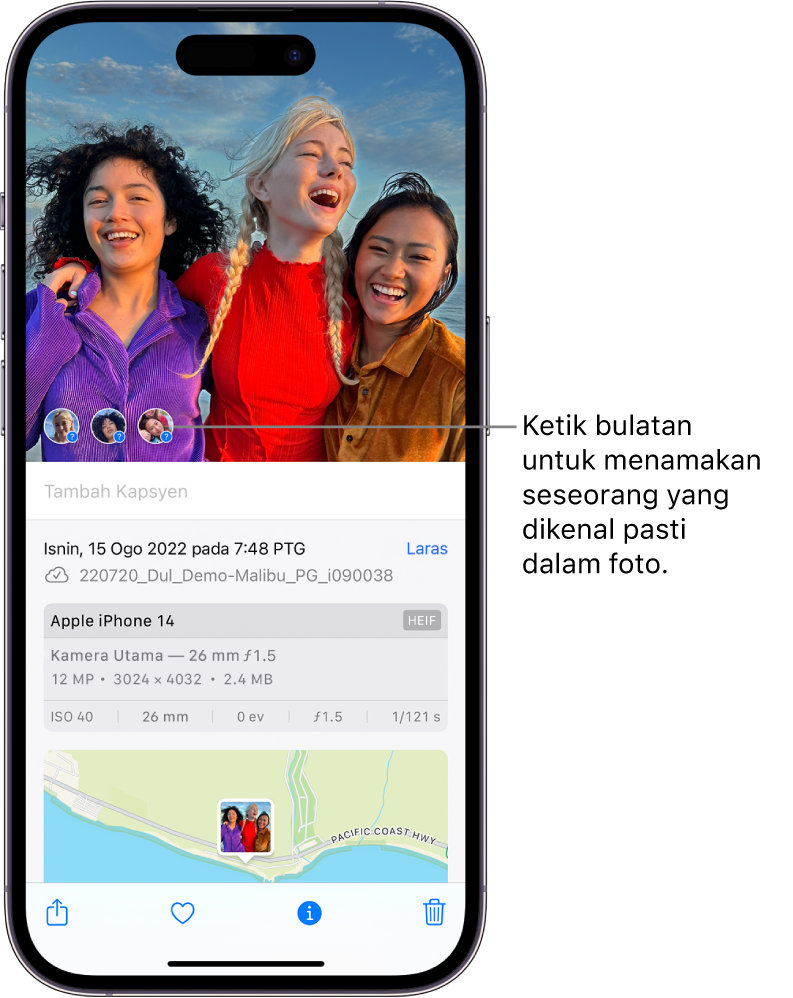 Bahagian separuh atas skrin iPhone menunjukkan foto dibuka dalam app Foto. Di penjuru kiri bawah foto, terdapat tanda soal di sebelah orang yang kelihatan dalam foto.