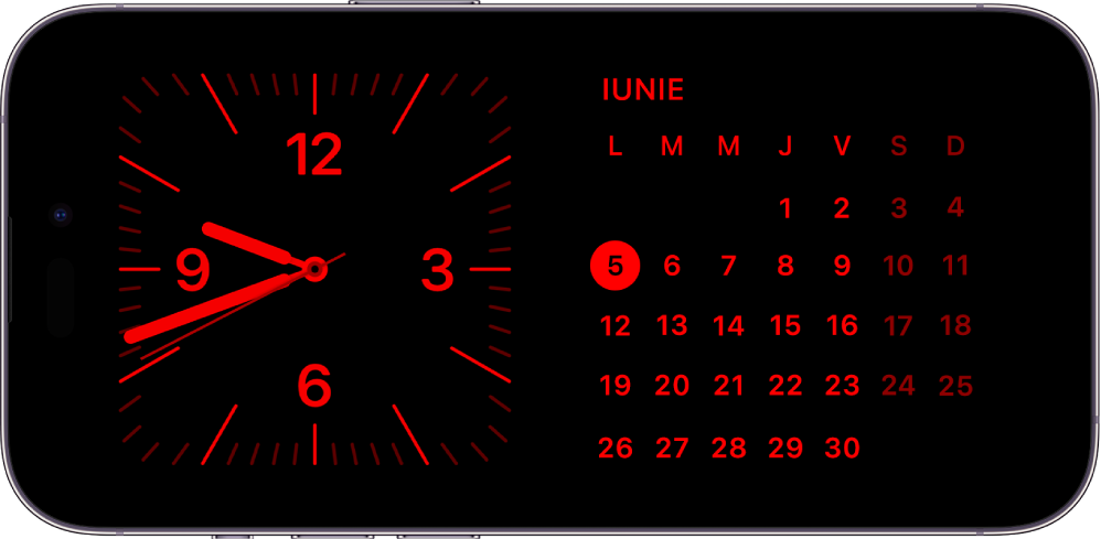 iPhone în modul “În repaus” în lumină ambiantă slabă, afișând widgeturile Ceas și Calendar cu o tentă roșie.