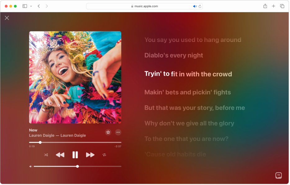 Trình phát toàn màn hình với một bài hát đang phát và lời bài hát ở bên phải, hiển thị trên màn hình theo thời gian với nhạc.