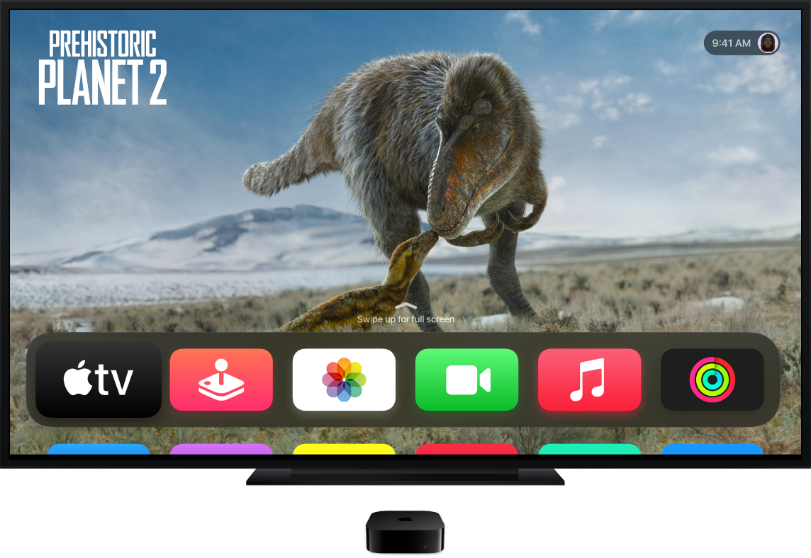 Apple TV, свързан към телевизор, показващ Начален екран