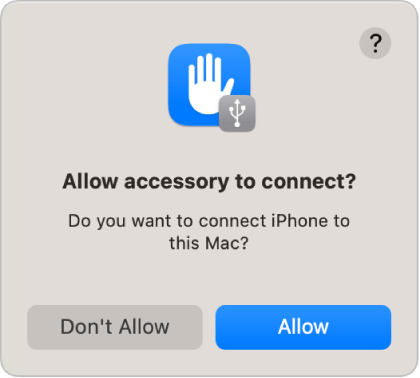 Un quadre de diàleg que demana a l’usuari que indiqui si es pot connectar un iPhone al Mac.