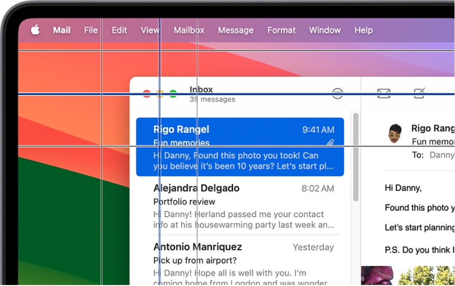 Appen Mail er åben på skrivebordet. En vandret og en lodret streg vises sammen på skærmen, og de to streger krydser hinanden på en knap i appen.