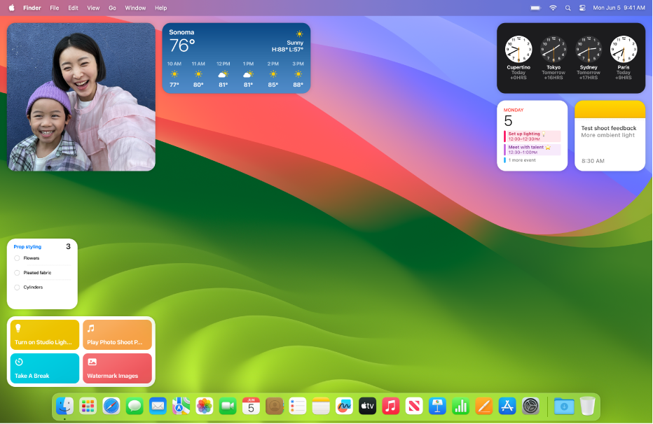 Macin työpöydällä näkyy useita widgettejä.
