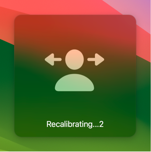 Odbrojavanje na zaslonu za rekalibraciju pokazivača za glavu, s prikazom "Rekalibriranje…2."