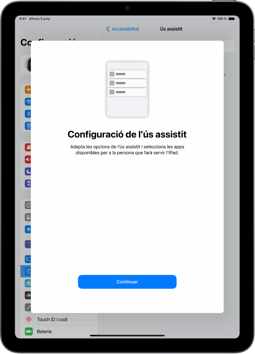 Un iPad amb la pantalla de configuració de l’ús assistit i el botó “Continuar” a la part inferior.