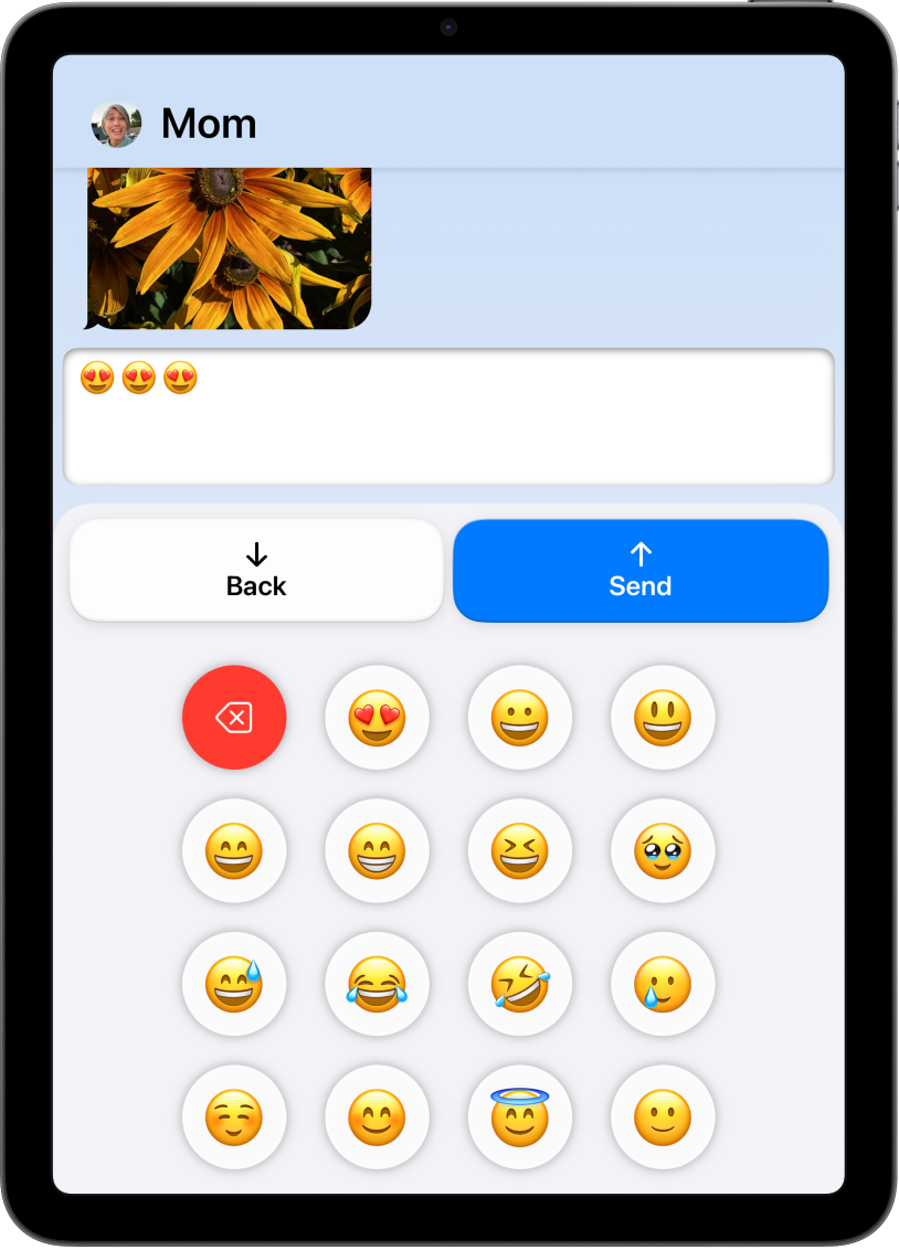 iPad kasutab režiimi Assistive Access ning avatud on rakendus Messages. Emoji-klaviatuuriga saadetakse sõnum.