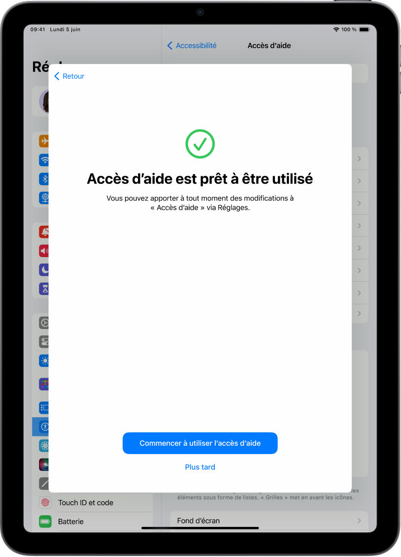 Un iPad montrant qu’« Accès d’aide » est prêt à être utilisé avec un bouton en bas pour activer la fonctionnalité Accès d’aide.