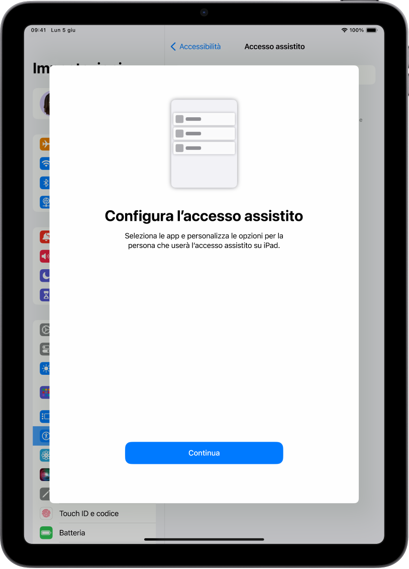 Su un iPad viene mostrata la schermata di configurazione di “Accesso assistito” con il pulsante Continua in basso.
