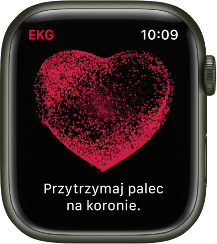 Ekran aplikacji EKG przedstawiający serce oraz napis „Przytrzymaj palec na koronie”.