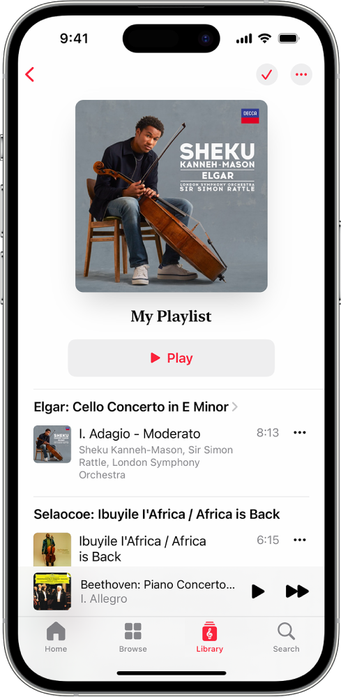 En iPhone med en personlig playliste i Apple Music Classical. Øverst på skærmen vises et albumbillede, navnet på playlisten og knappen Play. Miniafspilleren er nederst på skærmen og viser det spor, der afspilles i øjeblikket. Under miniafspilleren er knapperne Home, Browse, Library og Search.