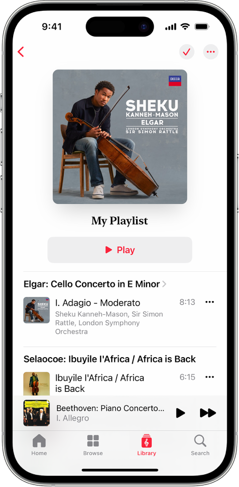 iPhone menampilkan daftar putar pribadi di Apple Music Classical. Di bagian atas layar terdapat gambar album, nama daftar putar, dan tombol Putar. MiniPlayer terdapat di dekat bagian bawah layar dan menampilkan track yang sedang diputar. Di bawah MiniPlayer adalah tombol Home, Browse, Library, dan Search.