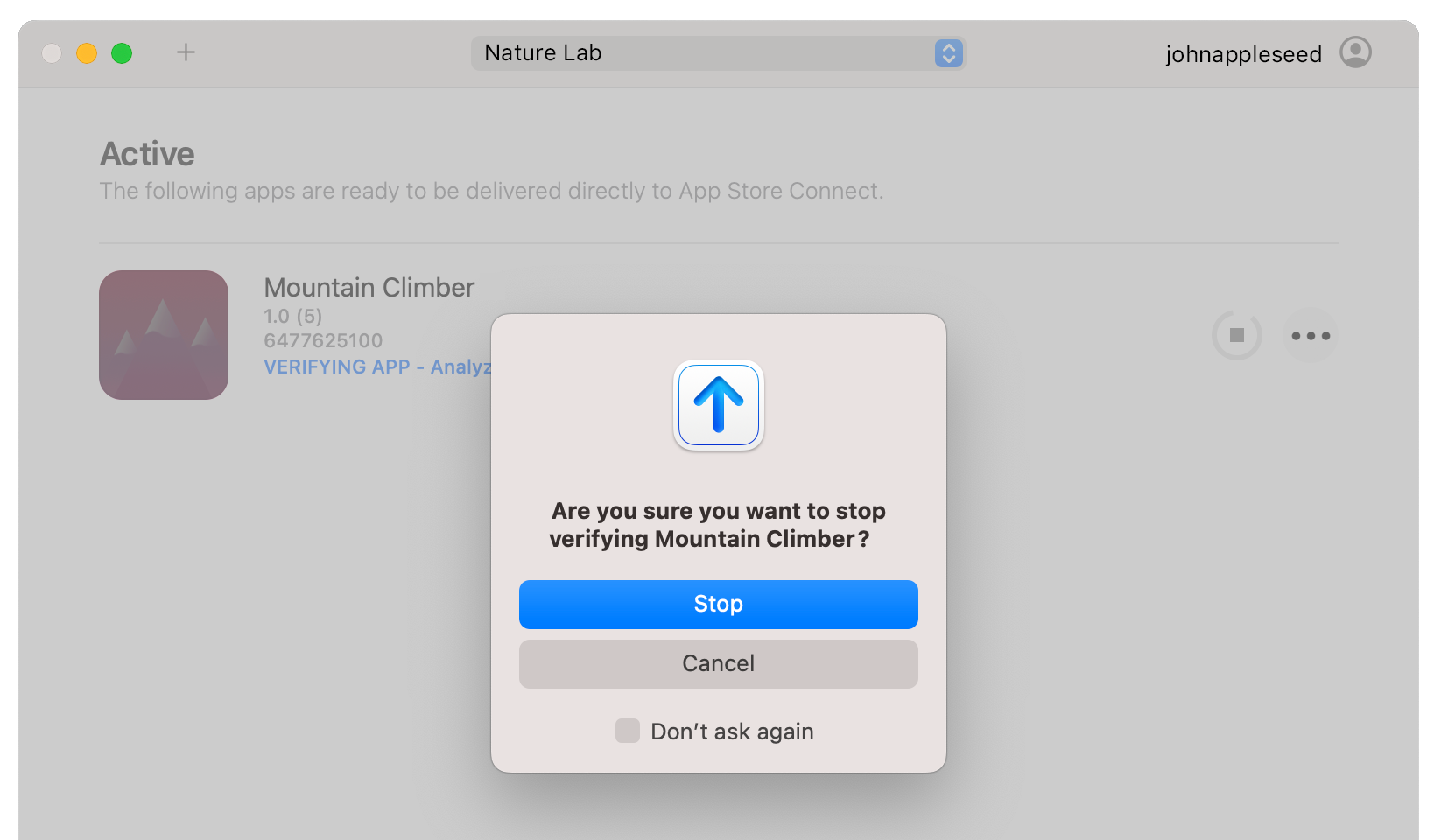 An example of the Transporter app window displaying the Stop pop-up with a Stop button.