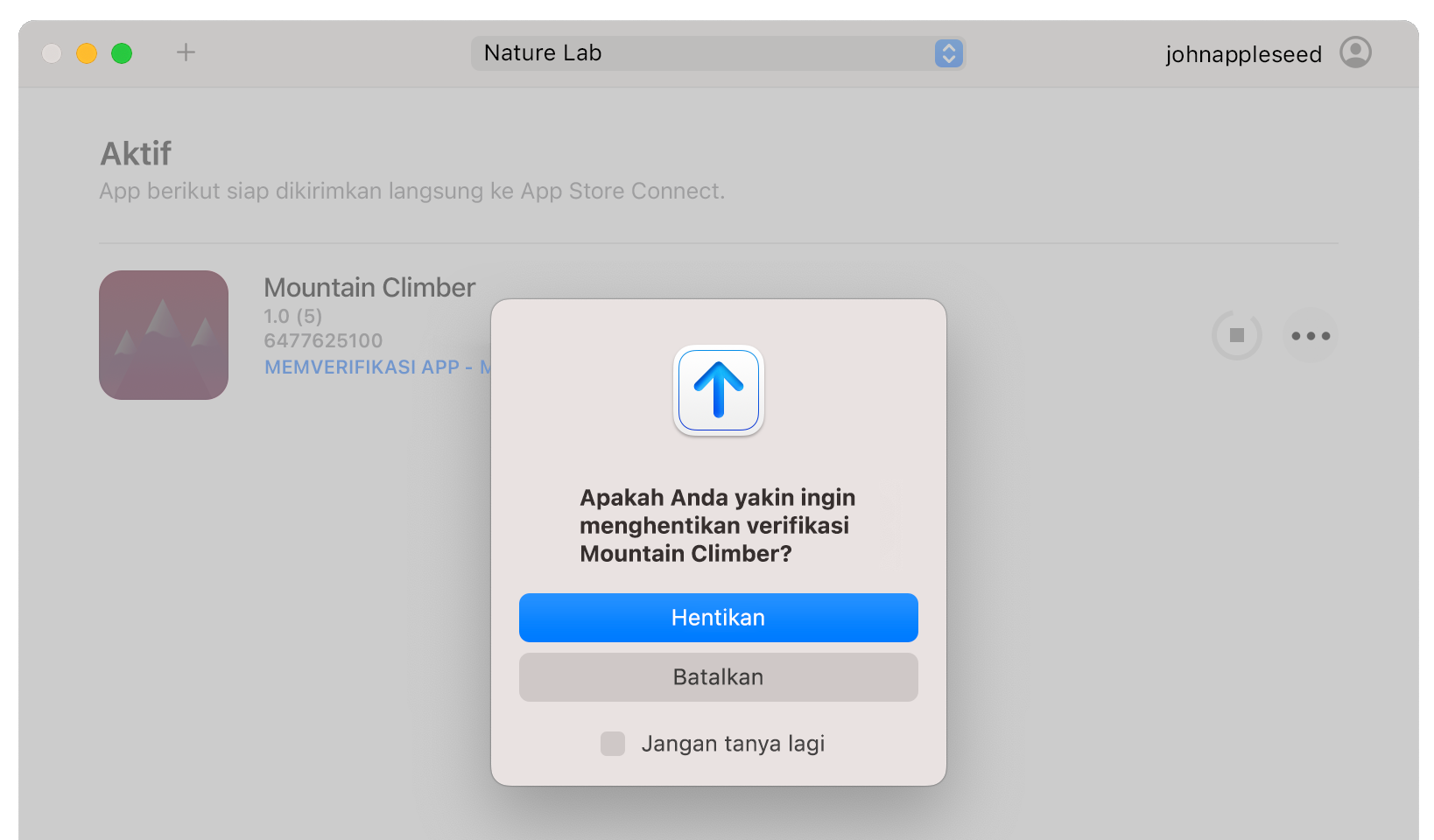 Contoh jendela app Transporter yang menampilkan pop-up Hentikan dengan tombol Hentikan.
