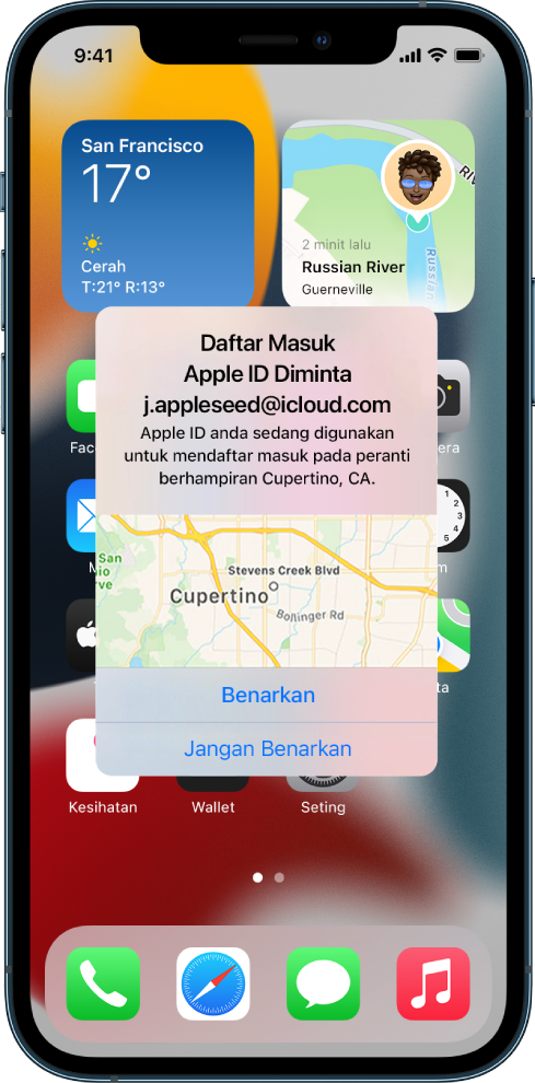 Skrin iPhone menunjukkan percubaan daftar masuk oleh pengguna pada peranti lain yang dikaitkan dengan akaun iCloud.